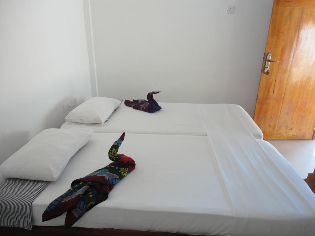 Yoho Hotel Arugambay Beach Inn Baie d'Arugam Chambre photo